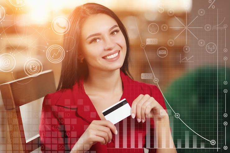 a woman holding credit card